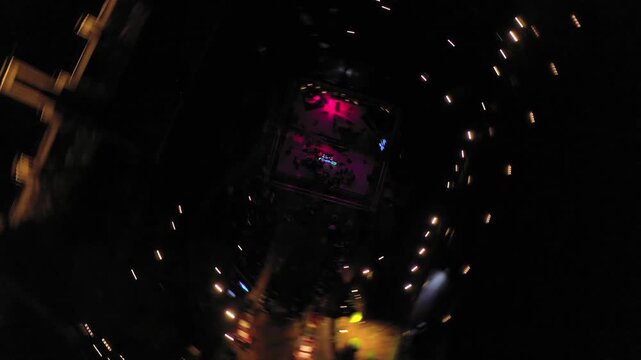 Night aerial rotating drone shot of people dancing at a Big Fat Indian Wedding