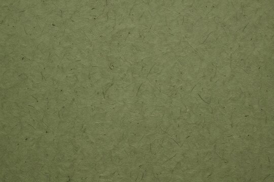 Textured green paper background