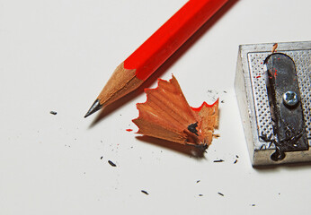 sharpened pencil with a metal manual sharpener