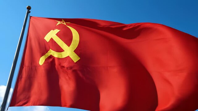 Red flag with hammer and sickle waving