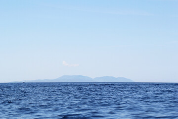 Distant Croatian Island in with Sea and Sky