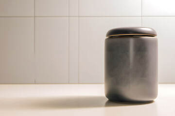 Matte ceramic canister on modern kitchen counter with left copy space clean premium interi