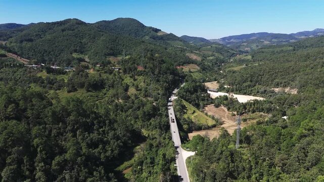 Fly over road part of Mae Hong Son loop, dense forest
