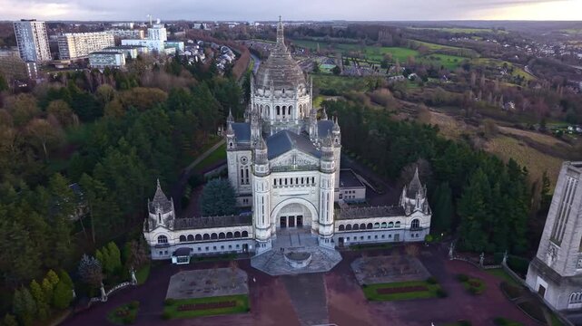Drone footage of the historic Basilica of Saint Th&eacute;r&egrave;se, Lisieux, Normandy, France. Aerial panoramic view