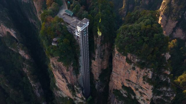 Bailong Elevator - Tallest Outdoor Elevator Built On Cliffside In The Wulingyuan Area Of Zhangjiajie, China. Aerial Shot