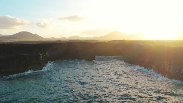 Los Hervideros is a dramatic stretch of volcanic coastline in Yaiza, Lanzarote, where the Atlantic Ocean crashes into sea caves and basaltic cliffs. Formed during the Timanfaya eruptions between 1730 