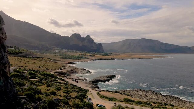Discover stunning landscapes from the Macari viewpoint, revealing the majestic San Vito Lo Capo cliffs and the serene coastline of Sicily.