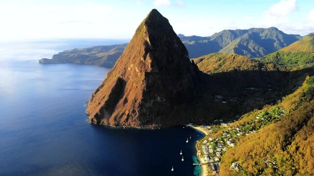 Experience breathtaking views of the iconic Pitons towering over the serene Caribbean Sea. Enjoy the lush landscapes, crystal-clear waters, and vibrant coastal life of St Lucia.