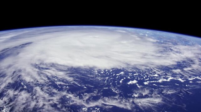 Massive hurricane swirling over Earth's blue oceans seen from space