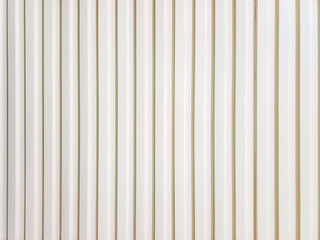 Obraz premium White metal plate template with vertical corrugated pattern. Industrial steel panel texture for warehouse wall background, shed siding, and modern architectural layout.