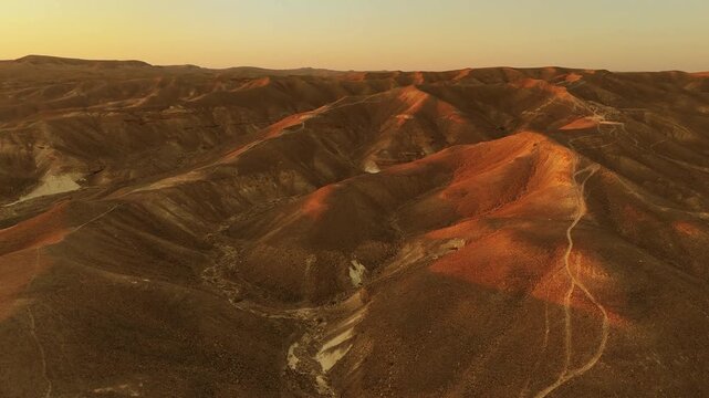 Aerial View Sunrise Over Paran Desert Israel

Drone footage captured on February 12 2026 glowing sunrise light across Paran desert hills Israel
