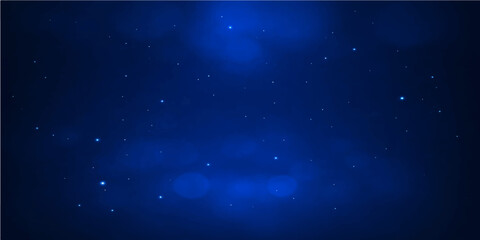Abstract blue starry night background with glowing particles and nebula light in a dark space galaxy universe illustration © FANUSH