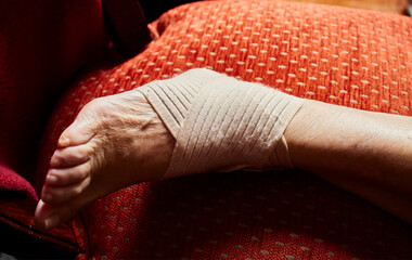 Ankle brace. Woman's foot wearing an ankle brace to recover from an instep injury.