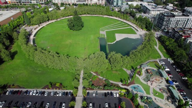 Suburban Park Aerial Revealing City Skyline Buildings