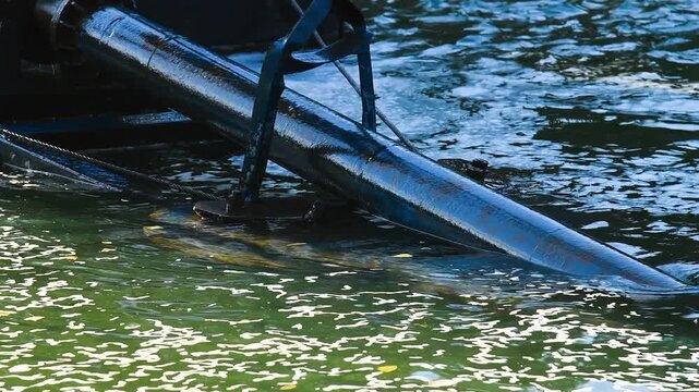 The driver digs the ground with a dredger