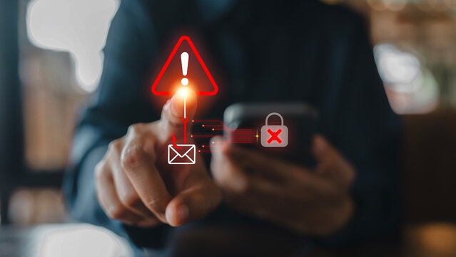 Person hand using smartphone touching virtual red warning sign and phishing email hook icon for cybersecurity scam alert concept, Cybercrime, Data breach, Identity theft, Financial fraud Hacking