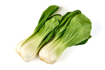 Two heads of fresh bok choy with vibrant green leaves and pale stalks, isolated on white background.
