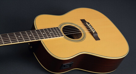 Stunning acoustic guitar on dark background perfect for music-related content
