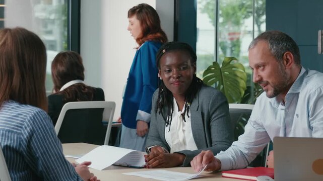 Diverse business team discussing project strategy
