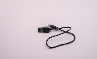 USB cable coiled up isolated on white background