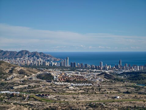 Rural urban landscape, View showcasing shift from agricultural areas to city high rises and residential zones