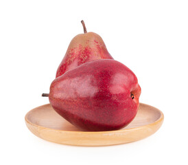 Fresh pear fruit on wooden plate isolated on white background.