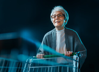 Senior Woman Shopping with Cart in Supermarket, Night Shopping