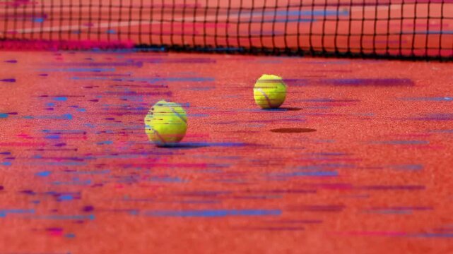 Three bright yellow tennis balls bouncing across red clay court under taut net flat design