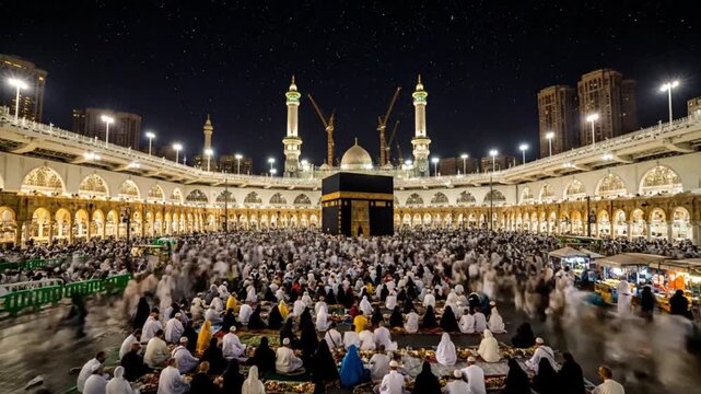 Kaaba at Masjid al-Haram in Mecca at Night with Thousands of Pilgrims Praying