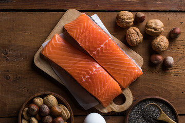 Selection food sources of omega 3 and unsaturated fats. Super food salmon, eeg, nuts, chia seeds, avocado.