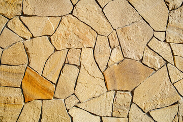 Obraz premium background of decorative finishing flat stone on the wall