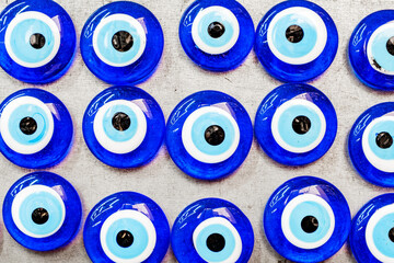 Fototapeta premium Nazar a bead from the evil eye in souvenir shop close-up