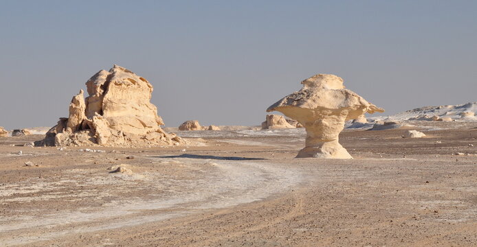 Desert Track and Chalk Rock Formations in the White Desert of Egypt