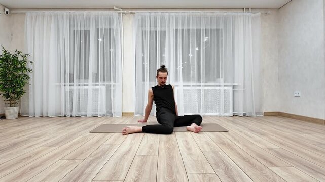 Gentle Seated Stretches. Relaxing Hip And Twist Exercises. Seated Movements Focusing On Flexibility And Breath. Calm Floor Routines Enhancing Mobility Through Gentle Breathing And Stretching
