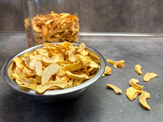 View of gray kitchen table with dried apples