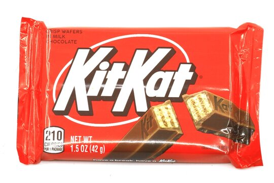 Kit Kat chocolate bar on white. Bars Kit Kat is produced by Nestle company