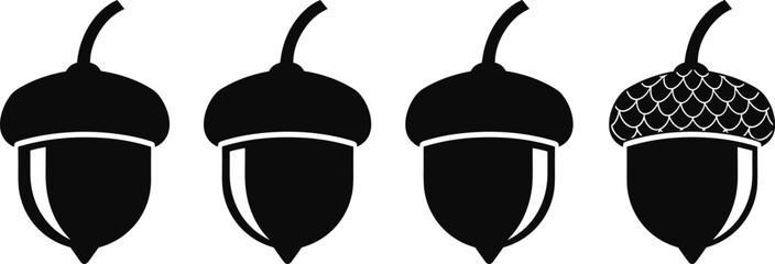 Vector illustration set of acorn icons featuring different nut silhouettes with stems and textured caps, minimalist black autumn forest symbols. © Shihab Creative