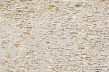 A sheet of creased brown paper as background