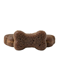 Dog treats shaped like bones on a black background