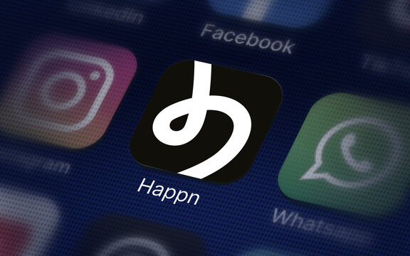 Happn company logo on the smartphone screen