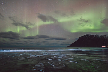 Northern lights - Norway - February arctic night sky with colorful aurora borealis © Cristian Bortes