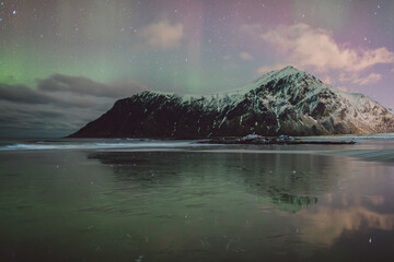 Northern lights - Norway - February arctic night sky with colorful aurora borealis © Cristian Bortes