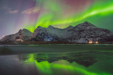 Northern lights - Norway - February arctic night sky with colorful aurora borealis © Cristian Bortes