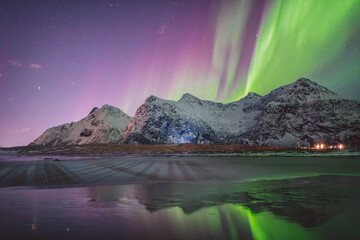 Northern lights - Norway - February arctic night sky with colorful aurora borealis © Cristian Bortes