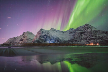 Northern lights - Norway - February arctic night sky with colorful aurora borealis © Cristian Bortes