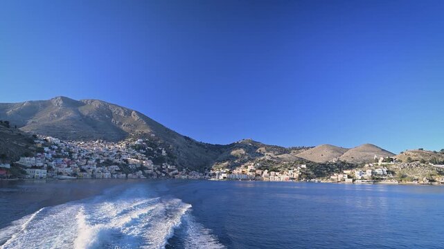 Ferry Wake Leaving the Town of Symi, Greece