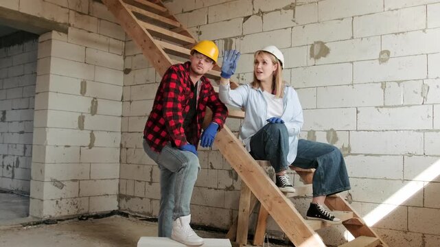 Pleased site supervisor coordinating contractor work on building object