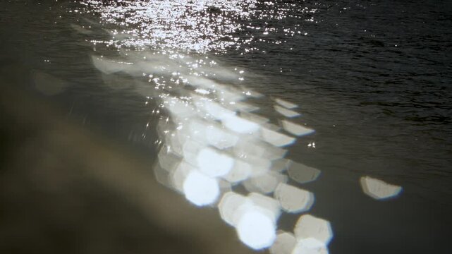 Reflection of the sun in the River La Seine 