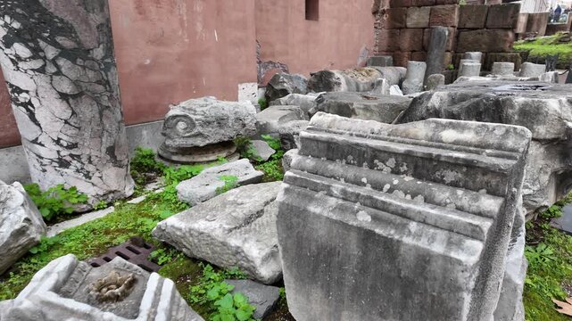 Slow motion view of ongoing archaeological excavations near the ancient Roman Theatre of Marcellus in Rome