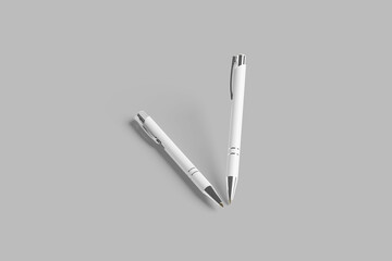 White pen isolated on grey background.